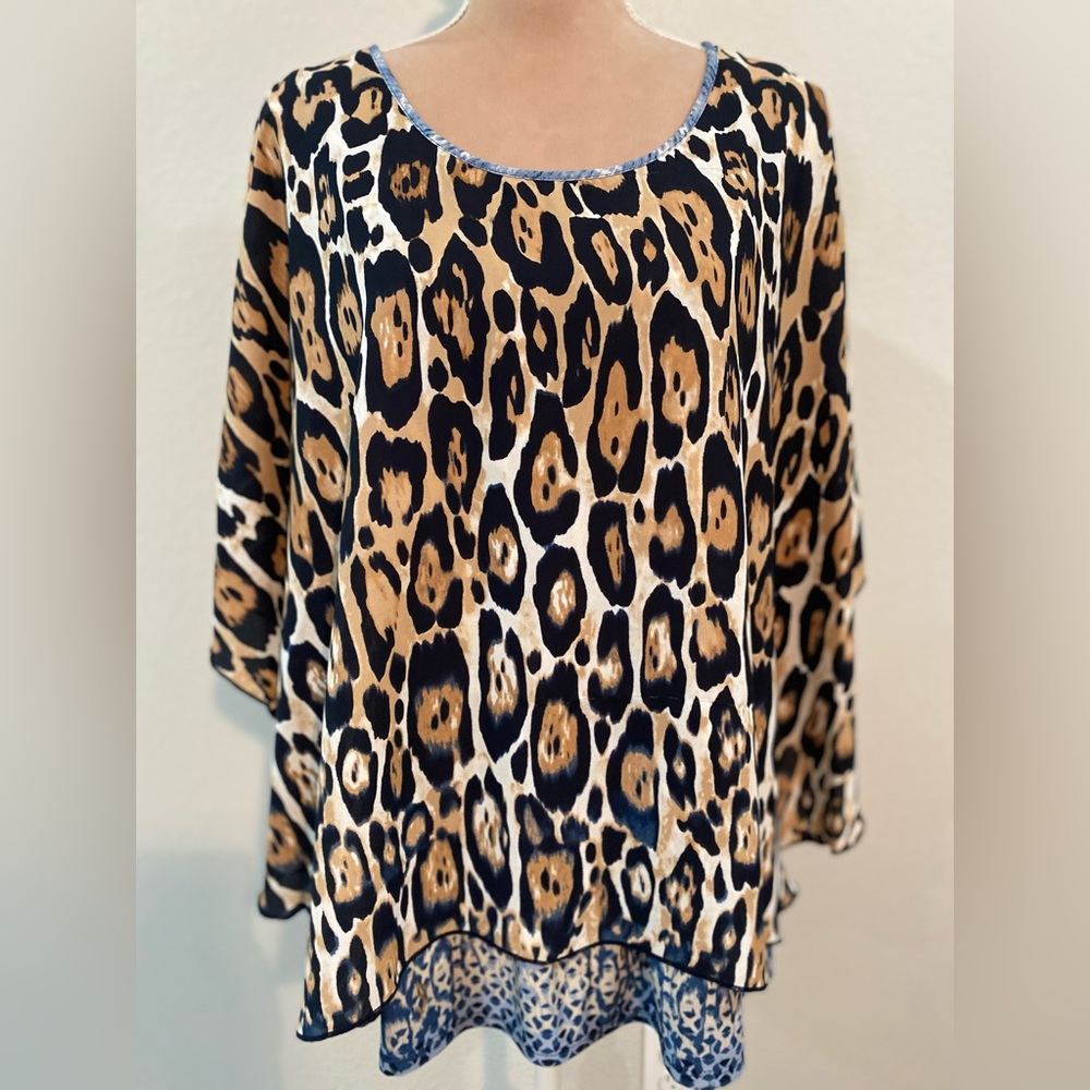 Peter Nygard top